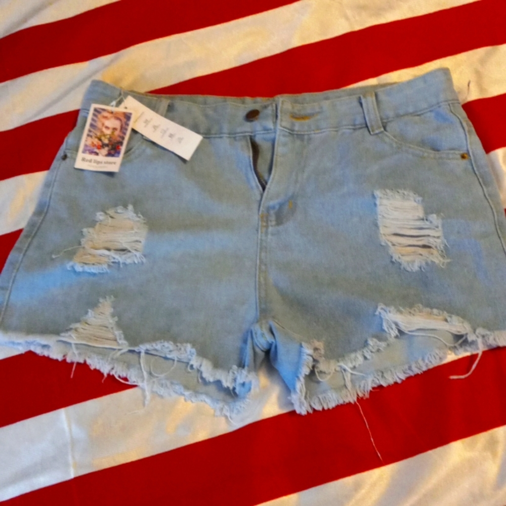 Brand Forever 21 size 30 distressed holes in the front
